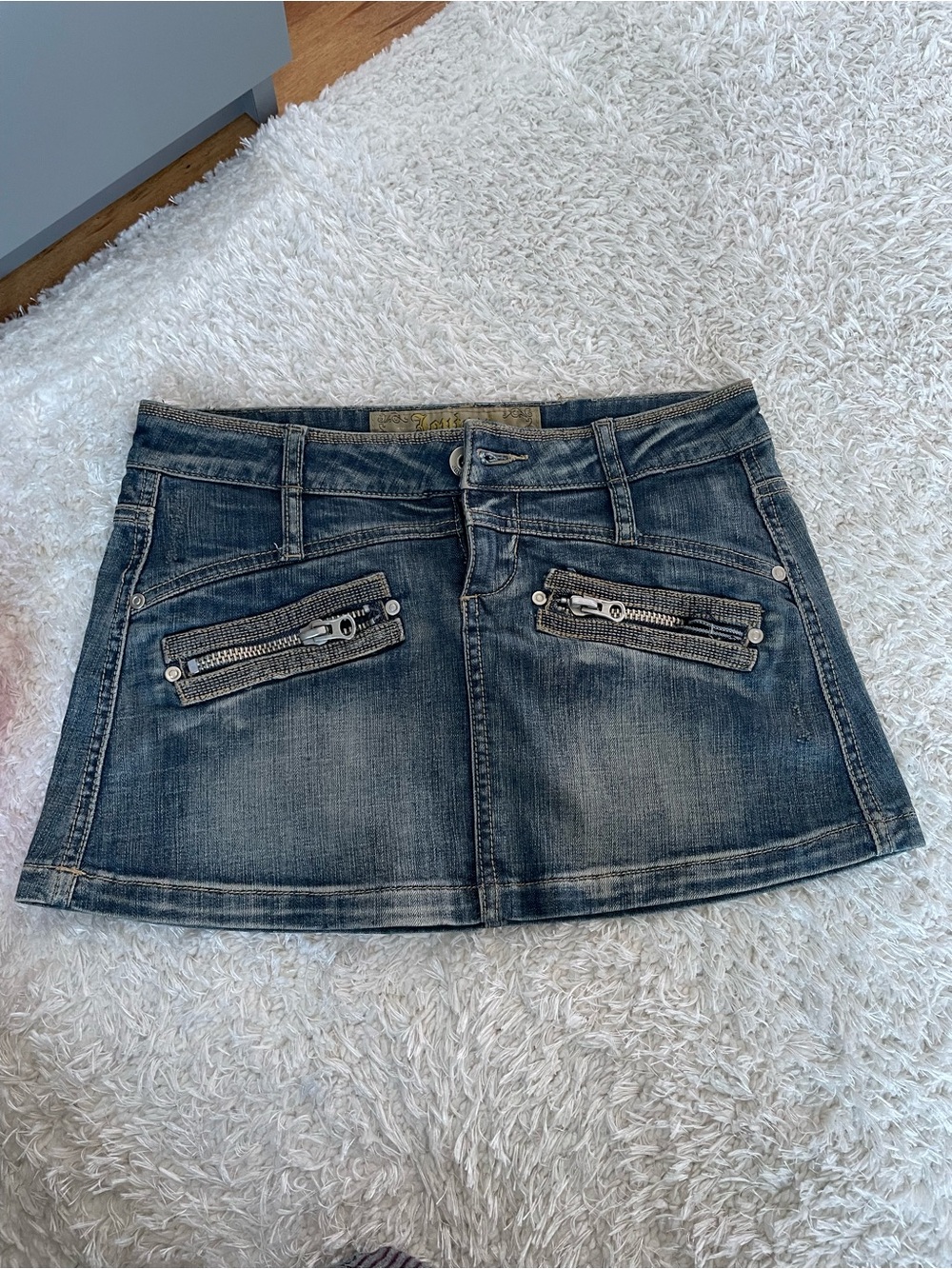 Distressed denim zipper mini skirt